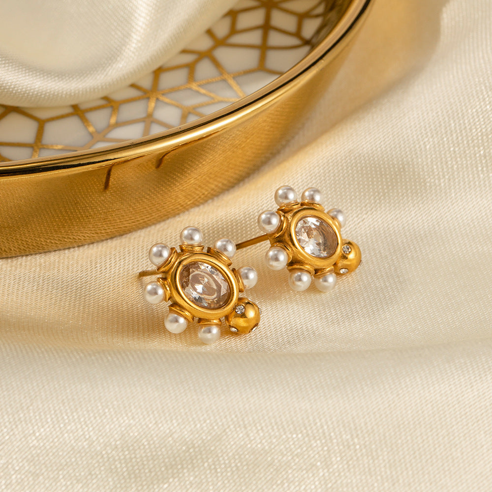 Boucles d'oreilles élégantes en or avec perle