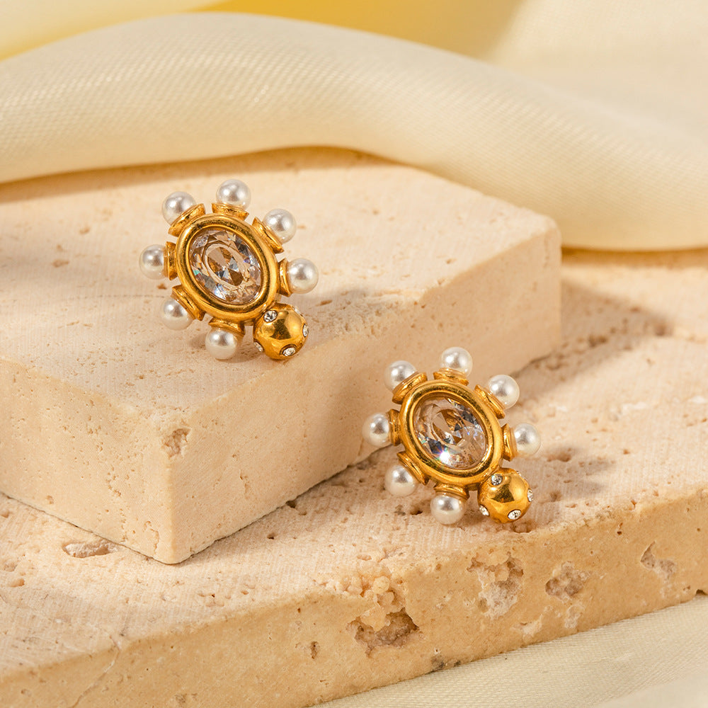Boucles d'oreilles élégantes en or avec perle