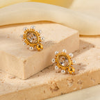 Boucles d'oreilles élégantes en or avec perle