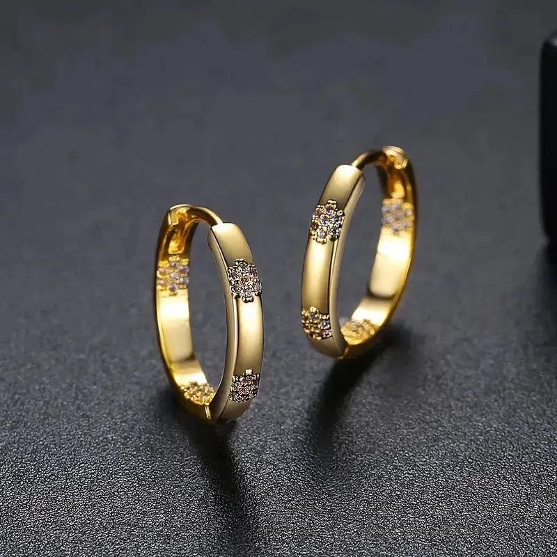 Boucles d'oreilles vintage avec motif de fleurs dorées