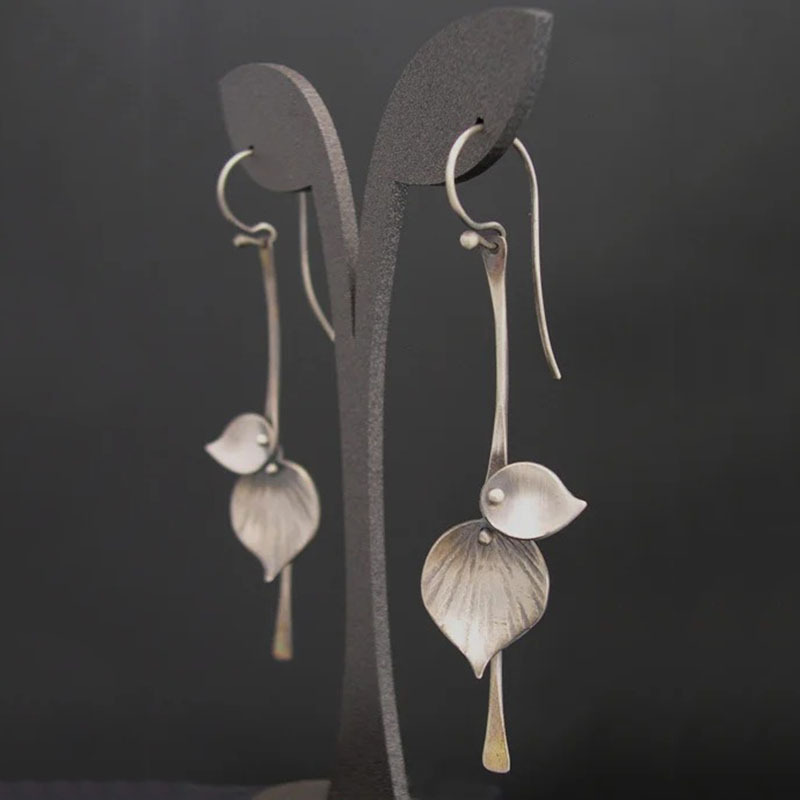 Boucles d'oreilles vintage en forme de feuille en argent